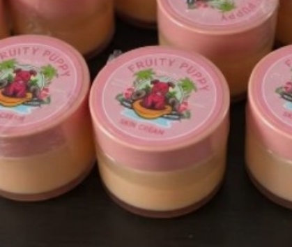Fruity Puppy skin cream jars with the fruit label